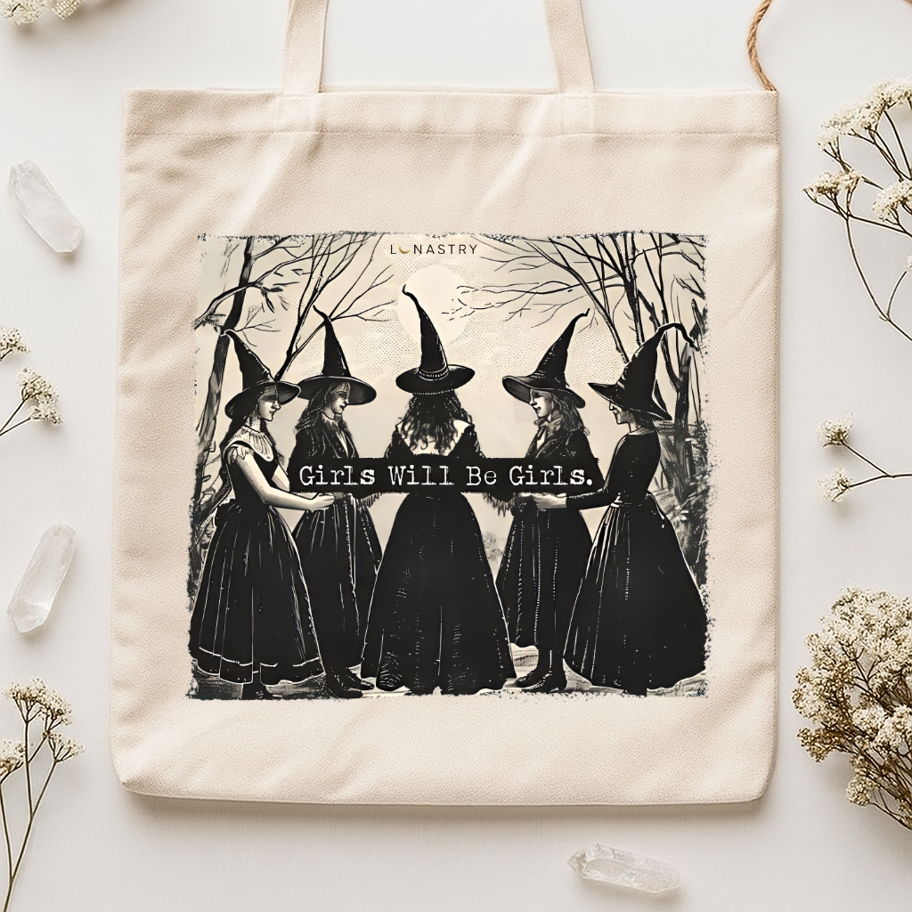 Girls Will Be Girls witchy tote bag, cotton canvas printed with a circle of witches in a spooky forest, at Ordinary Magic in Savannah, GA.