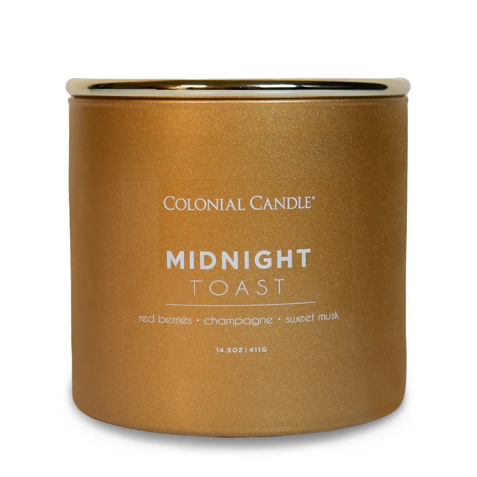 Midnight Toast three-wick jar candle with a gold lid