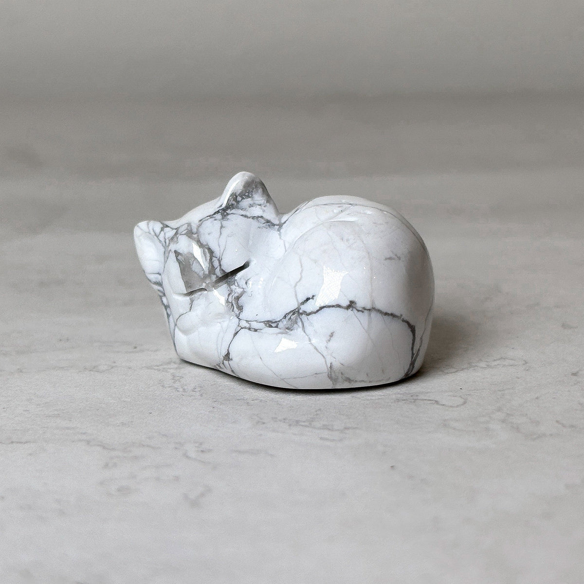 Polished sleeping cat white howlite, 1", crystal carving, view 11, at Ordinary Magic in Savannah, GA.