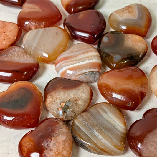 Carnelian agate puff hearts, alternate view, at Ordinary Magic in Savannah, GA.