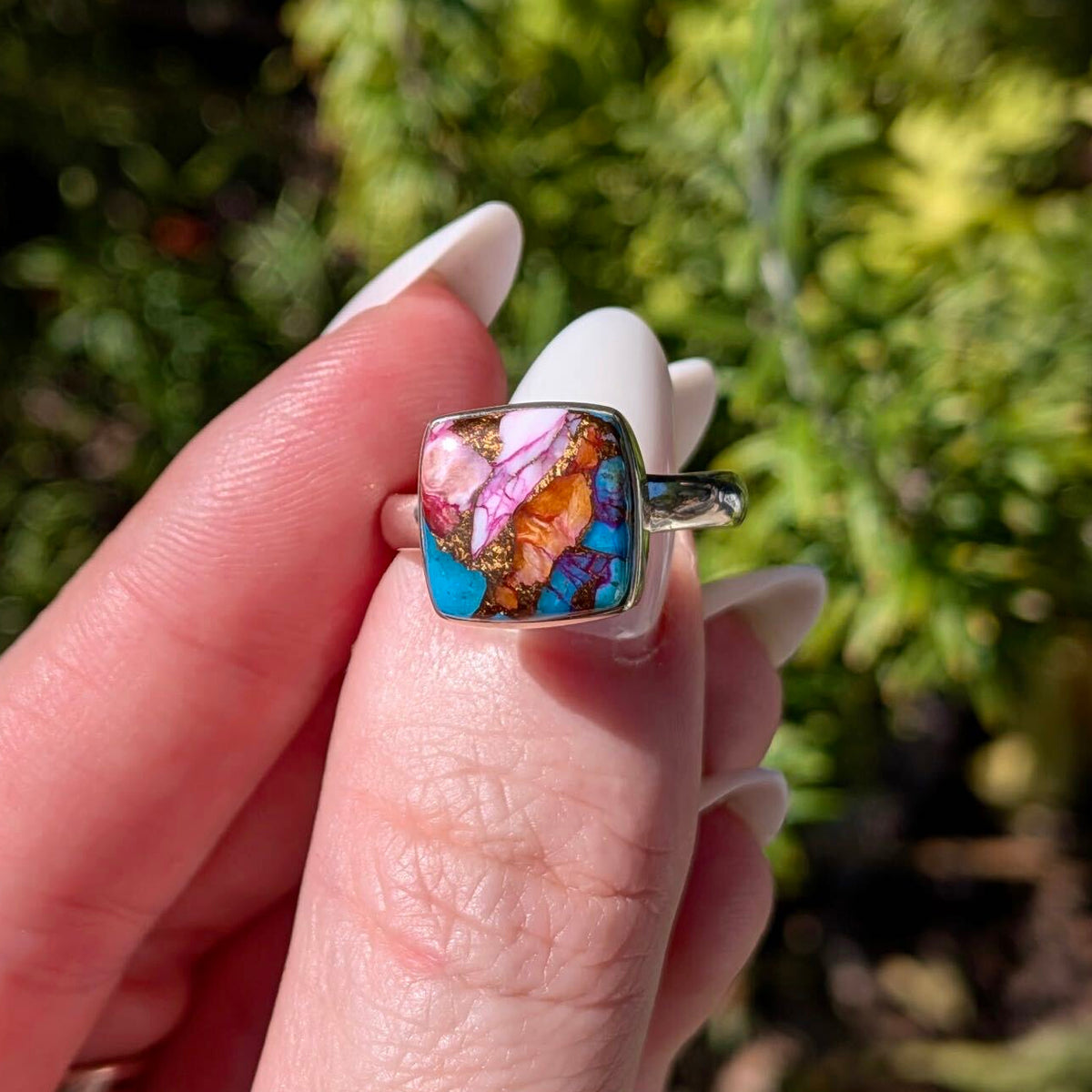 Pink dahlia turquoise sterling silver ring, angled view of pink stone — Ordinary Magic, Savannah GA