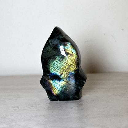 Polished labradorite freeform with blue-gold flash, additional view, at Ordinary Magic in Savannah, GA.