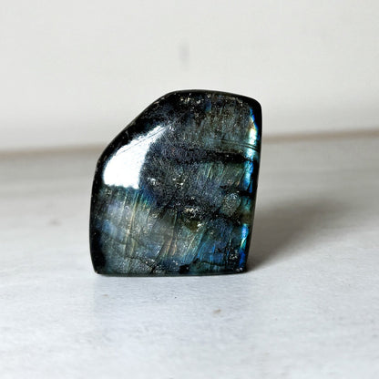 Polished labradorite freeform with blue-gold flash, further view, at Ordinary Magic in Savannah, GA.