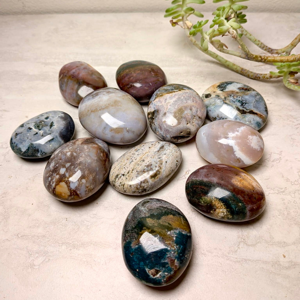 Ocean jasper mini palmstones, polished and rounded with natural orb patterns, at Ordinary Magic in Savannah, GA.