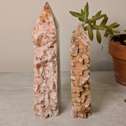 Red calcite druzy tower, second view, at Ordinary Magic in Savannah, GA.