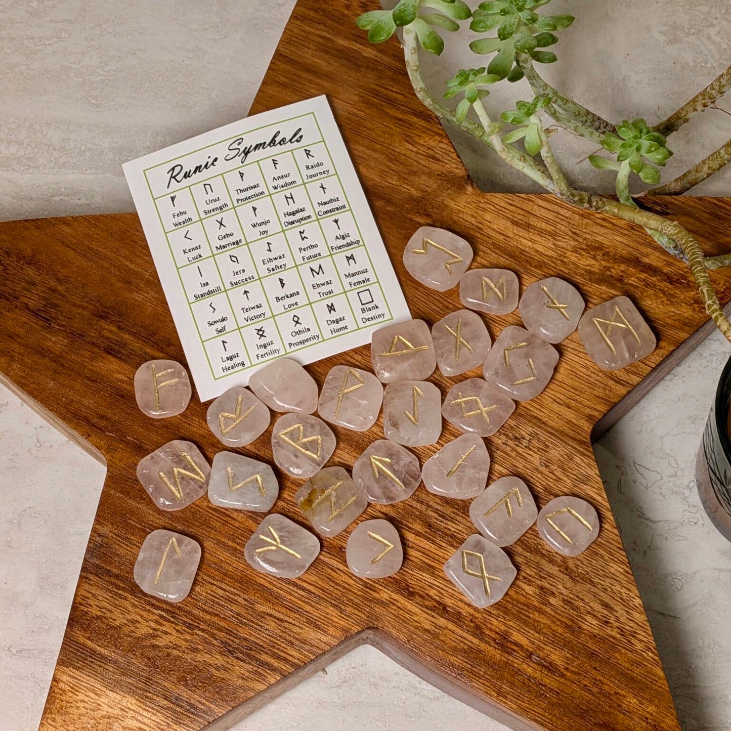 Crystal rune set in rose quartz, at Ordinary Magic in Savannah, GA.