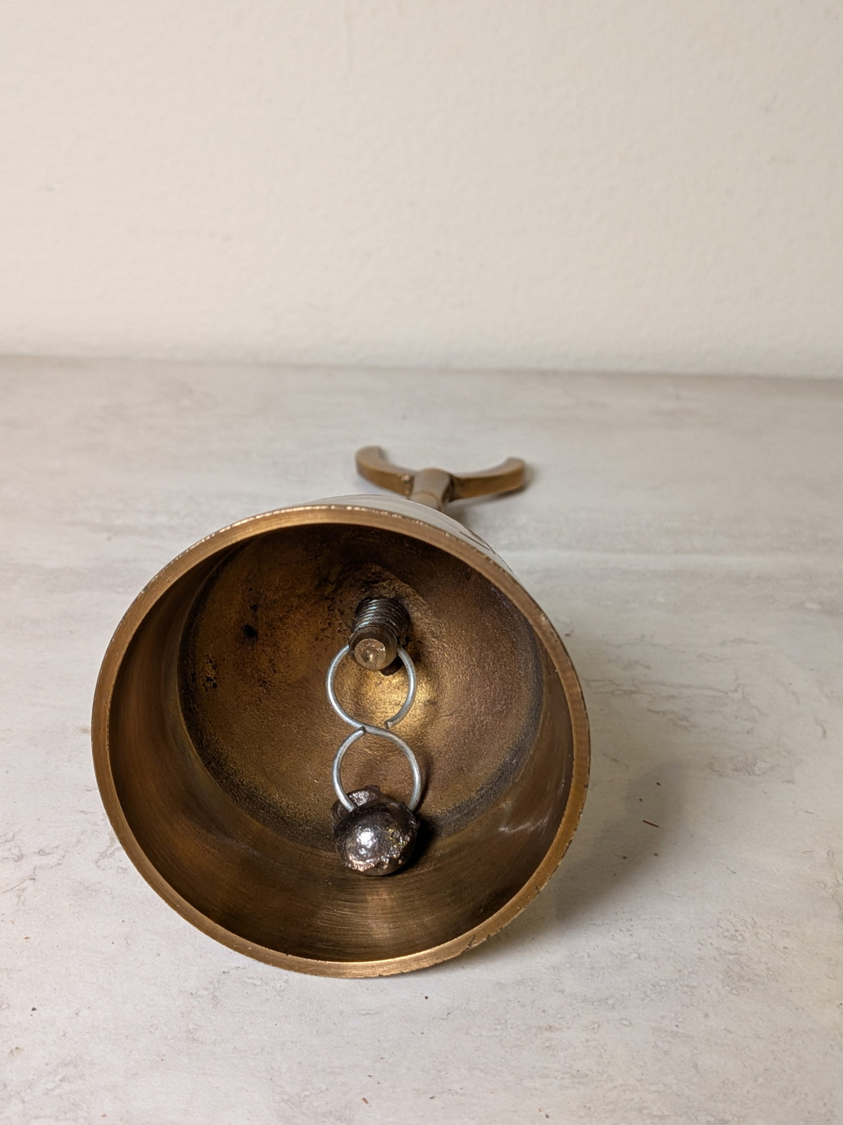 Triple Moon brass altar bell, alternate view, at Ordinary Magic in Savannah, GA.