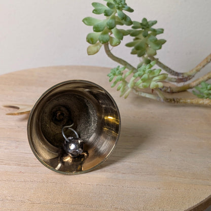 Triple Moon brass altar bell, second view, at Ordinary Magic in Savannah, GA.