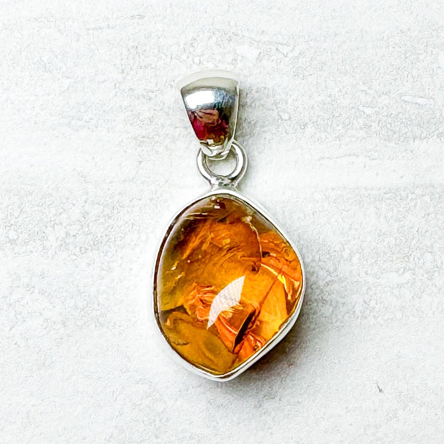 Amber with Silver Pendants