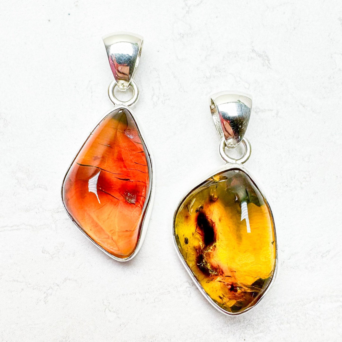 Amber with Silver Pendants