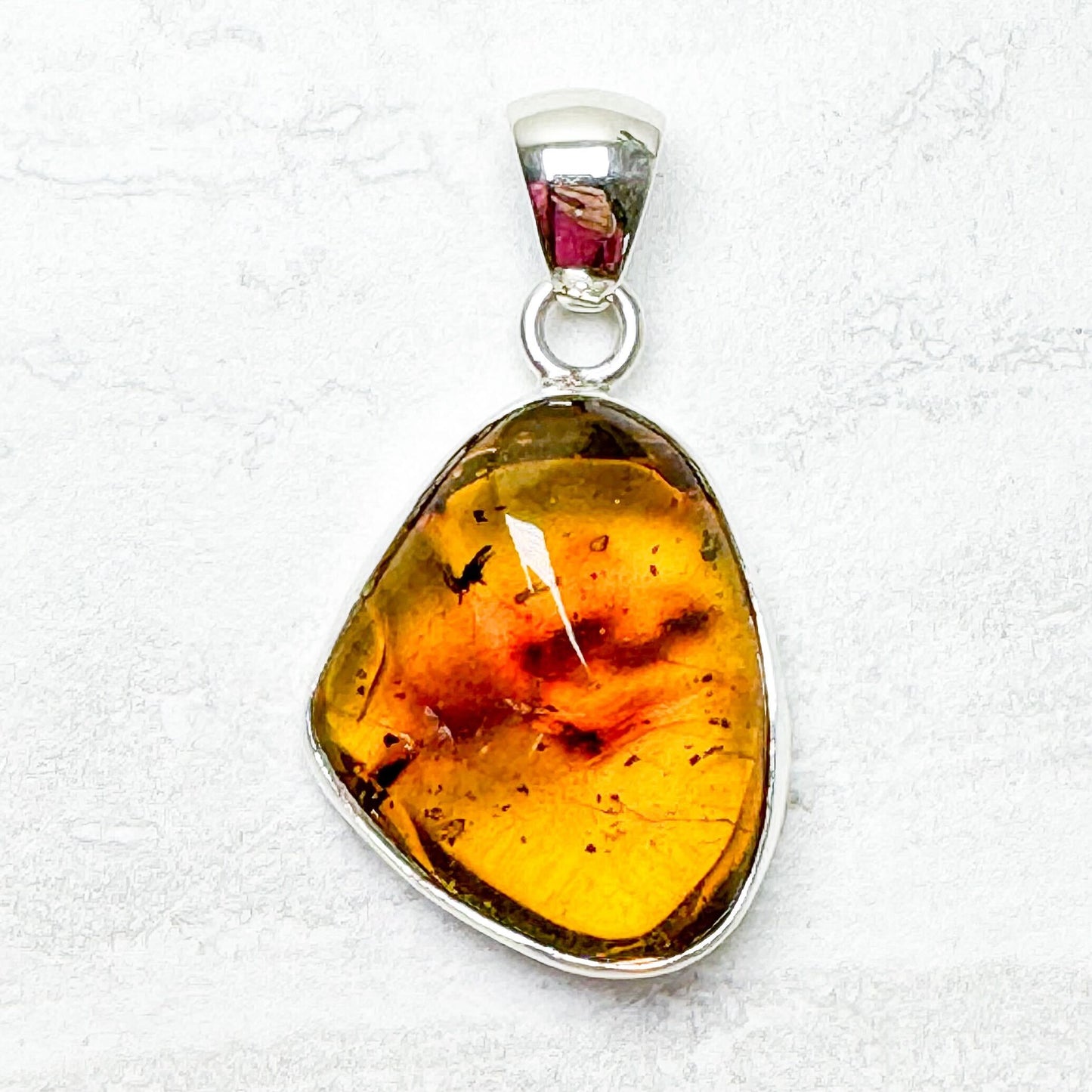 Amber with Silver Pendants