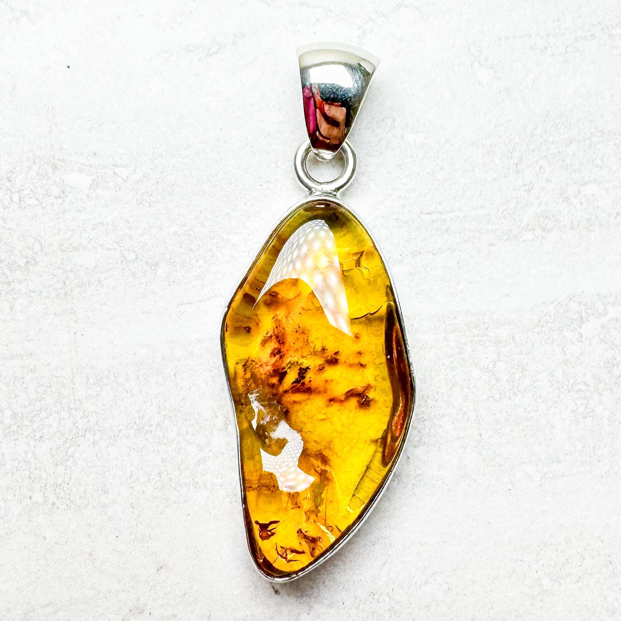 Amber with Silver Pendants