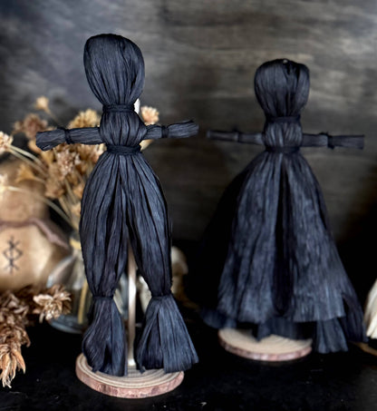 Handmade black corn husk doll folk poppet bound with twine, at Ordinary Magic in Savannah, GA.