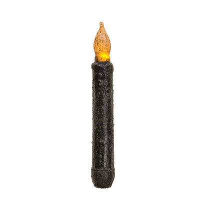 A single black textured faux candle with a glowing orange-yellow flame tip, isolated on a white background.