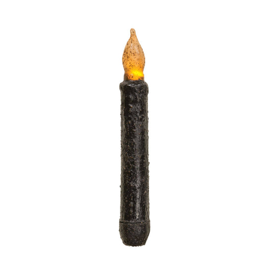 A single black textured faux candle with a glowing orange-yellow flame tip, isolated on a white background.