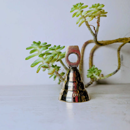 Handcrafted brass bell, one of six assorted designs, view 6, at Ordinary Magic in Savannah, GA.