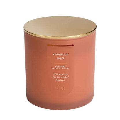 Cue Cedarwood Amber candle jar, rugged cedarwood and warm amber — Ordinary Magic, Savannah, GA.