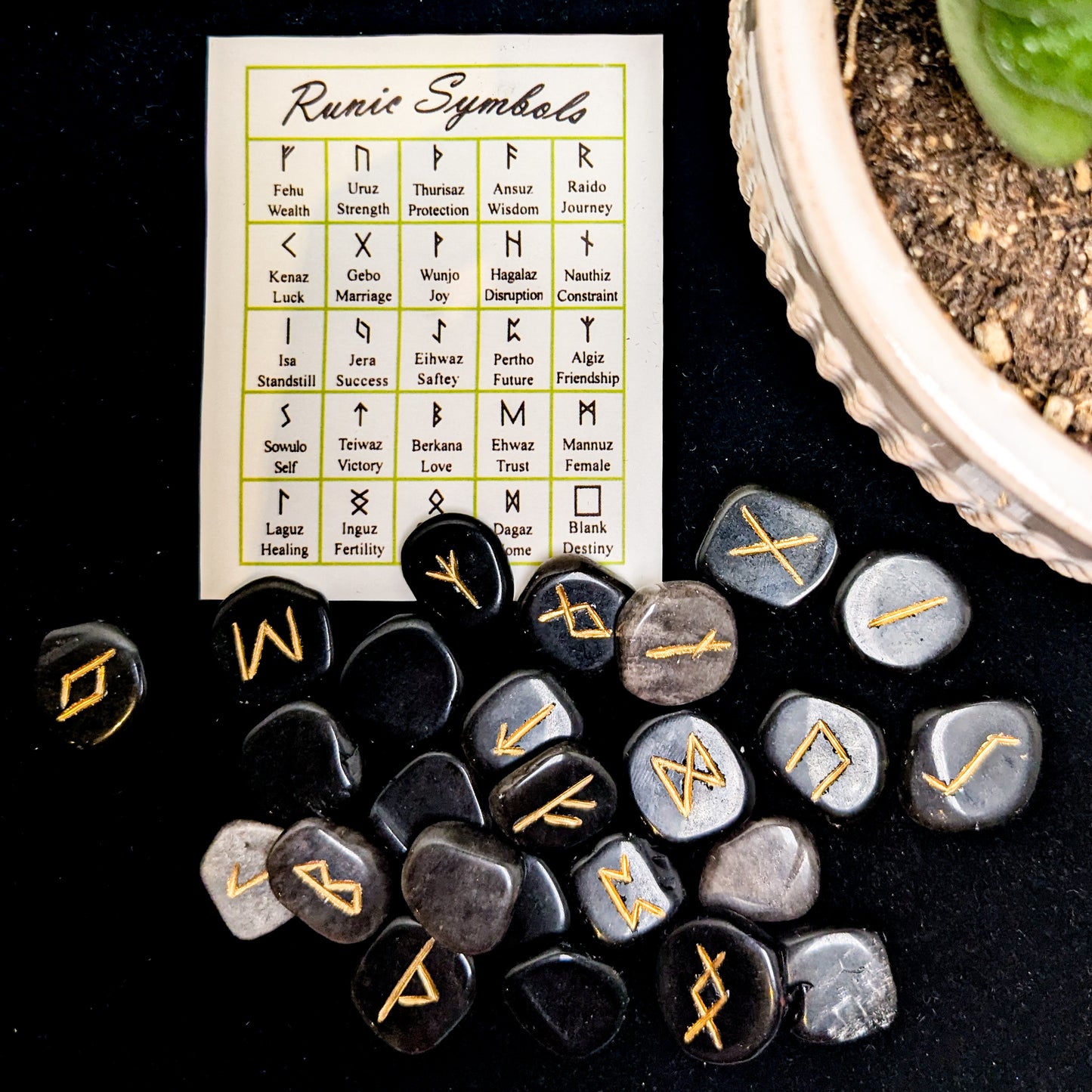 Crystal rune set in black obsidian, at Ordinary Magic in Savannah, GA.