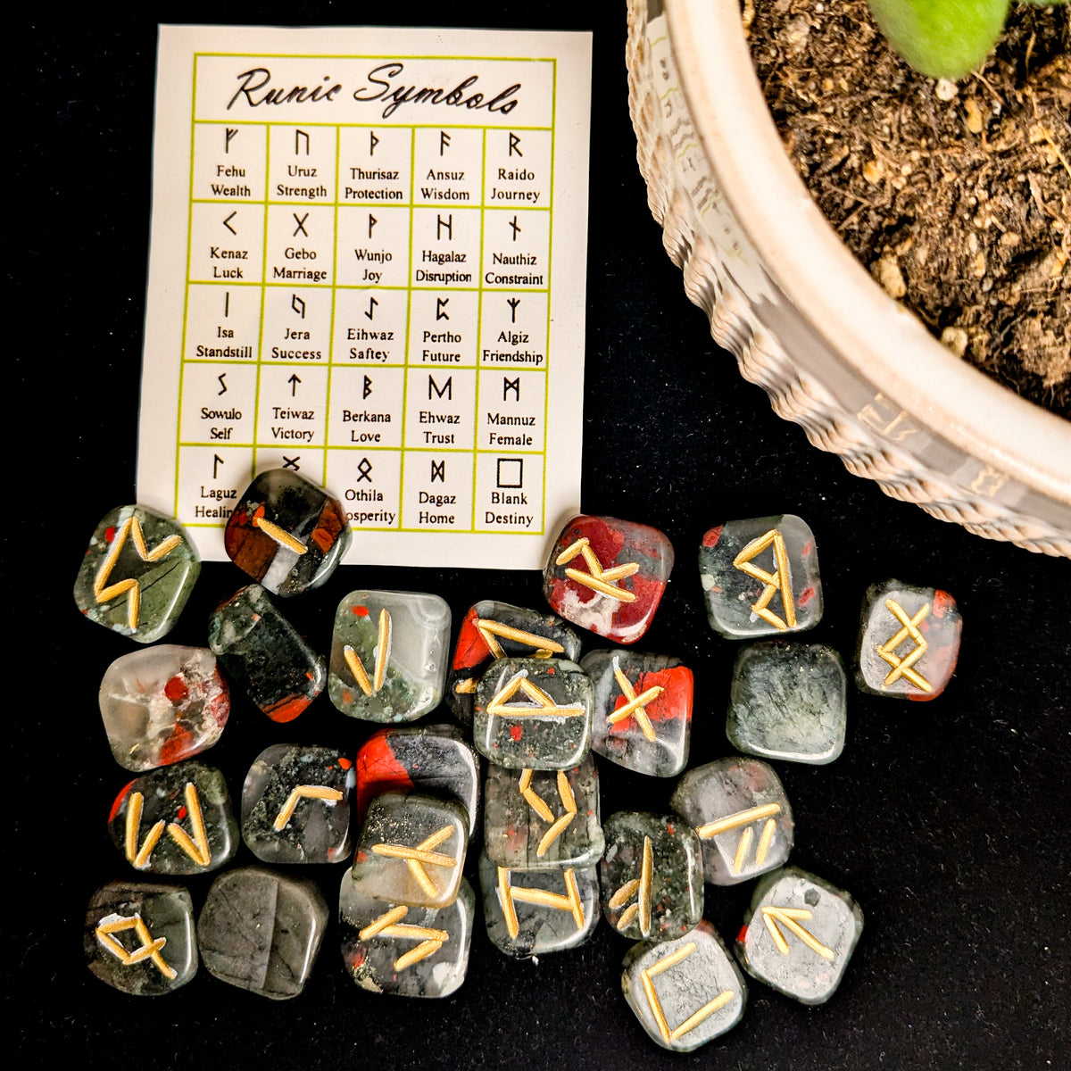 Crystal rune set in bloodstone, at Ordinary Magic in Savannah, GA.