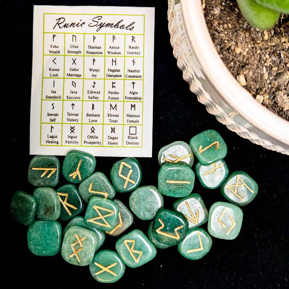 A set of polished crystal runes engraved with Elder Futhark letters, at Ordinary Magic in Savannah, GA.