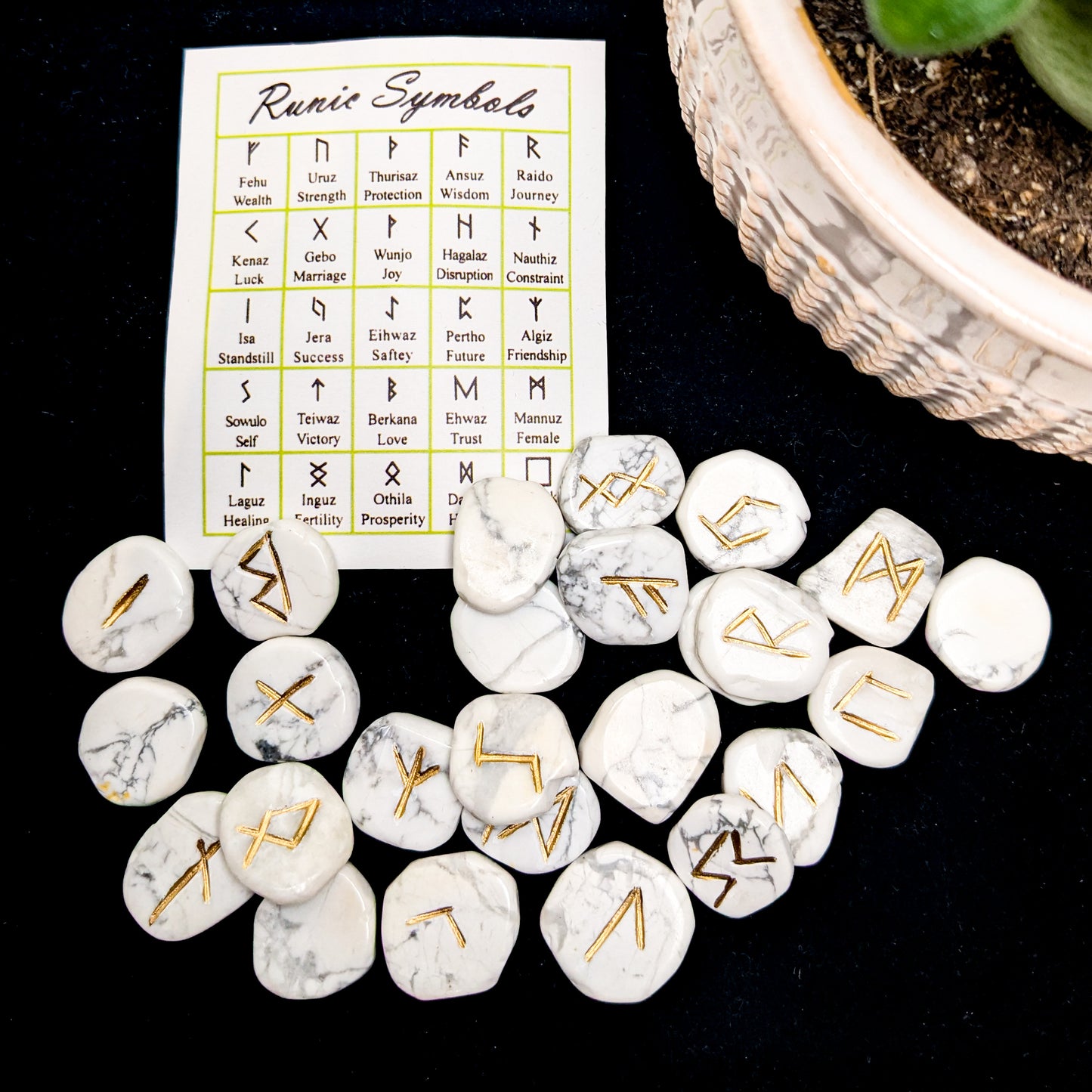 Crystal rune set in white howlite, at Ordinary Magic in Savannah, GA.