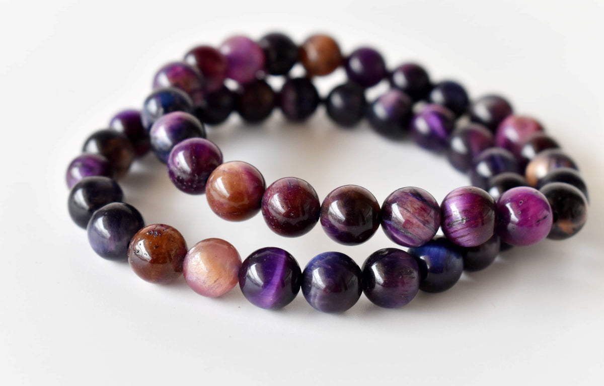 Violet tiger cat's eye beaded bracelet, second view.