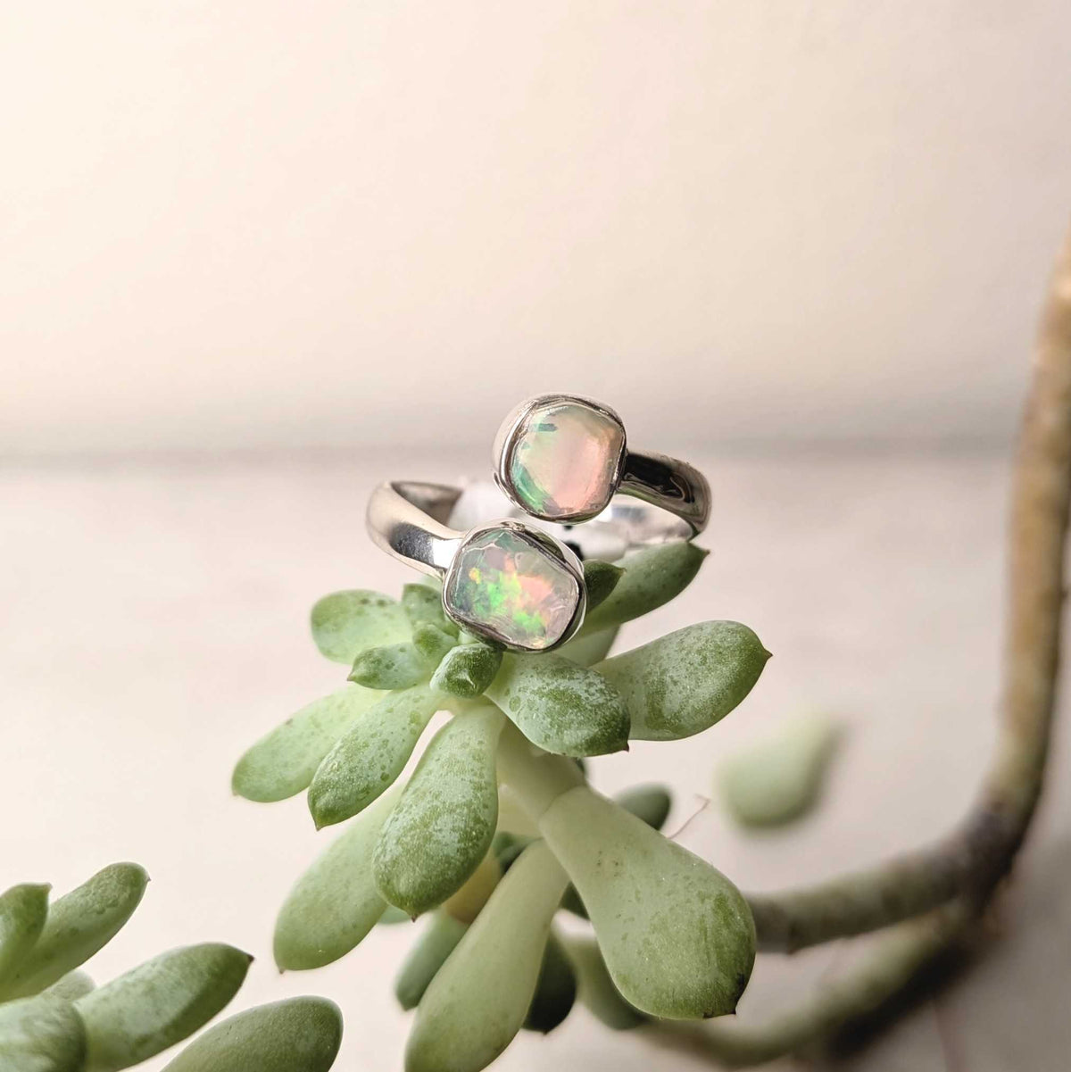 Ethiopian opal bezel-set in a sterling silver ring with flashes of color, at Ordinary Magic in Savannah, GA.