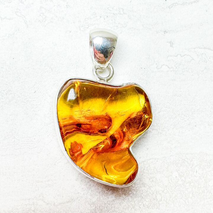 Amber with Silver Pendants
