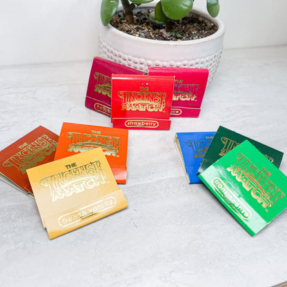 Matchbooks of scented incense matches with assorted covers.