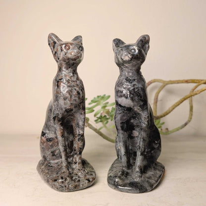 Carved stone cat figure in larvikite and yooperlite, at Ordinary Magic in Savannah, GA.