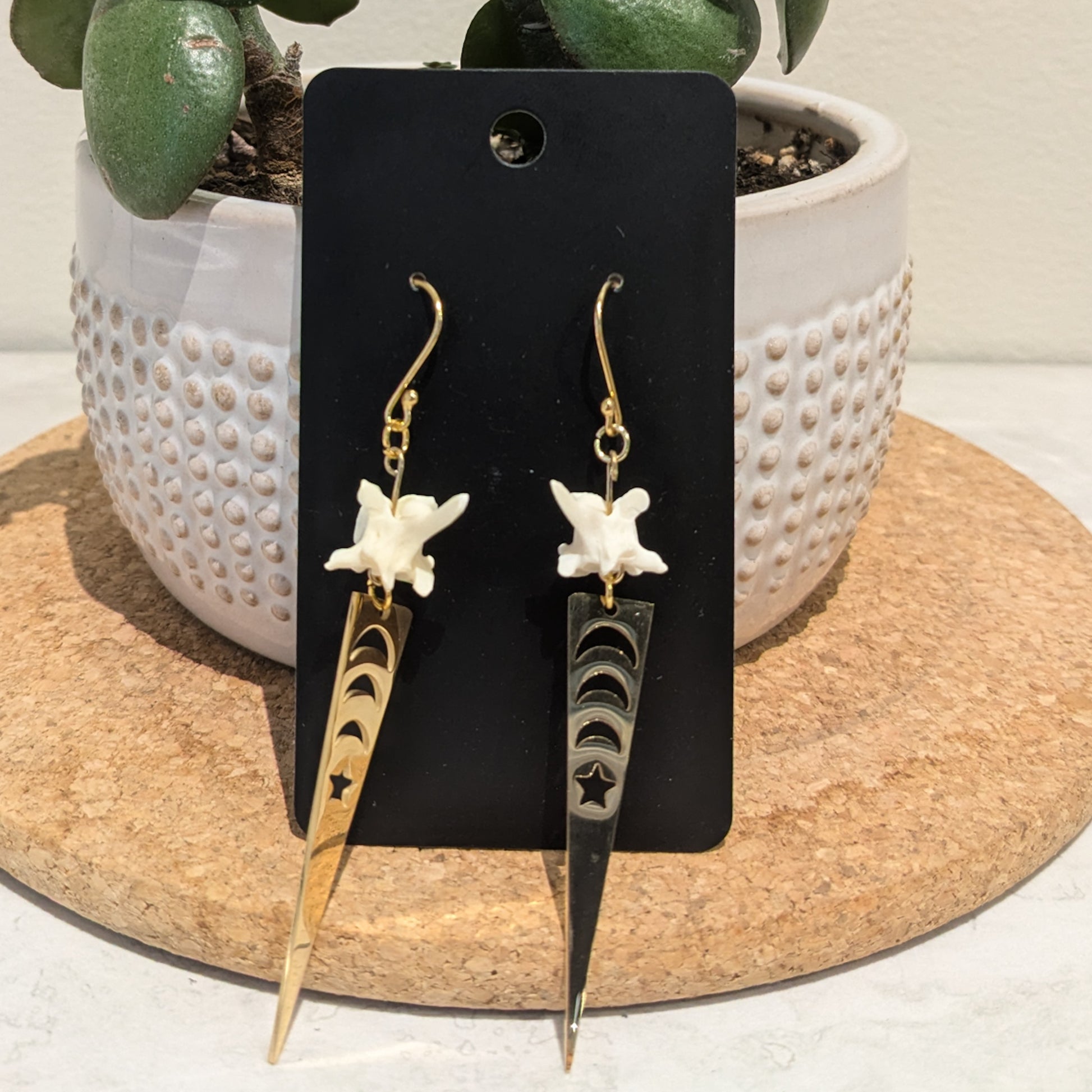 Handmade jewelry by Little Curiosity Lab, a local artist.