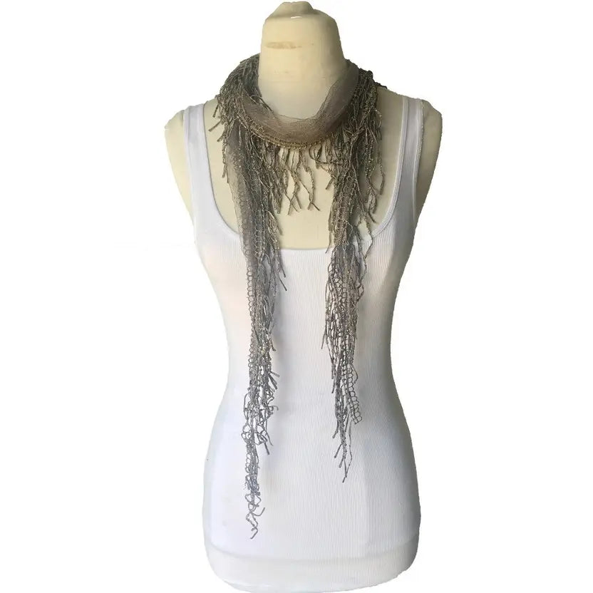 Little triangle lace scarf in gray, at Ordinary Magic in Savannah, GA.