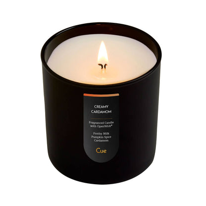 Cue Creamy Cardamom candle, an 8.5 oz jar with frothed-milk and spiced-caramel notes — Ordinary Magic, Savannah, GA.