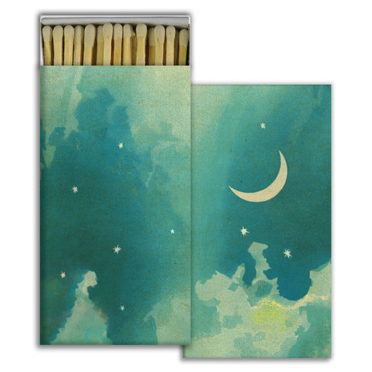 Matchbox with artistic design of a crescent moon and stars on a teal background