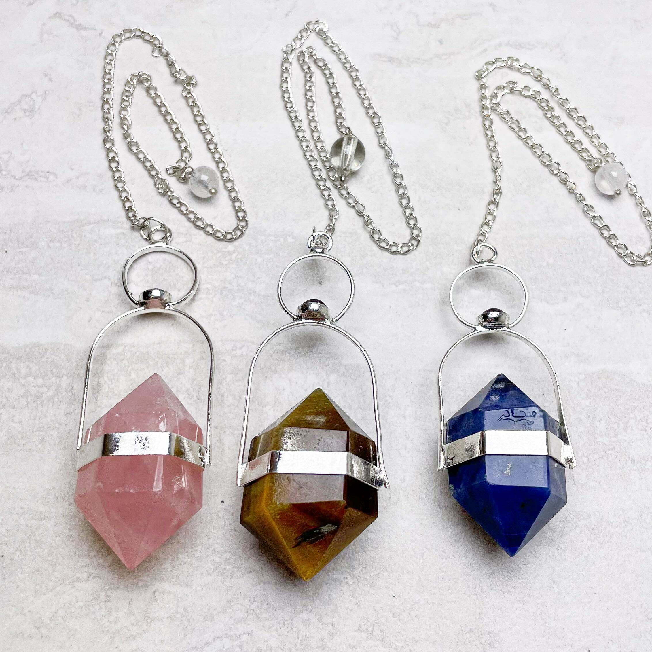 Double Terminated Crystal Pendulums
