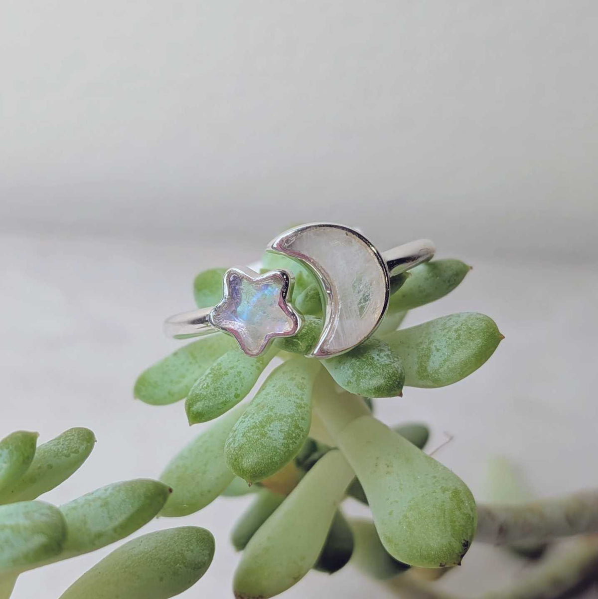 Rainbow moonstone sterling silver stacking ring with a crescent moon and star accent