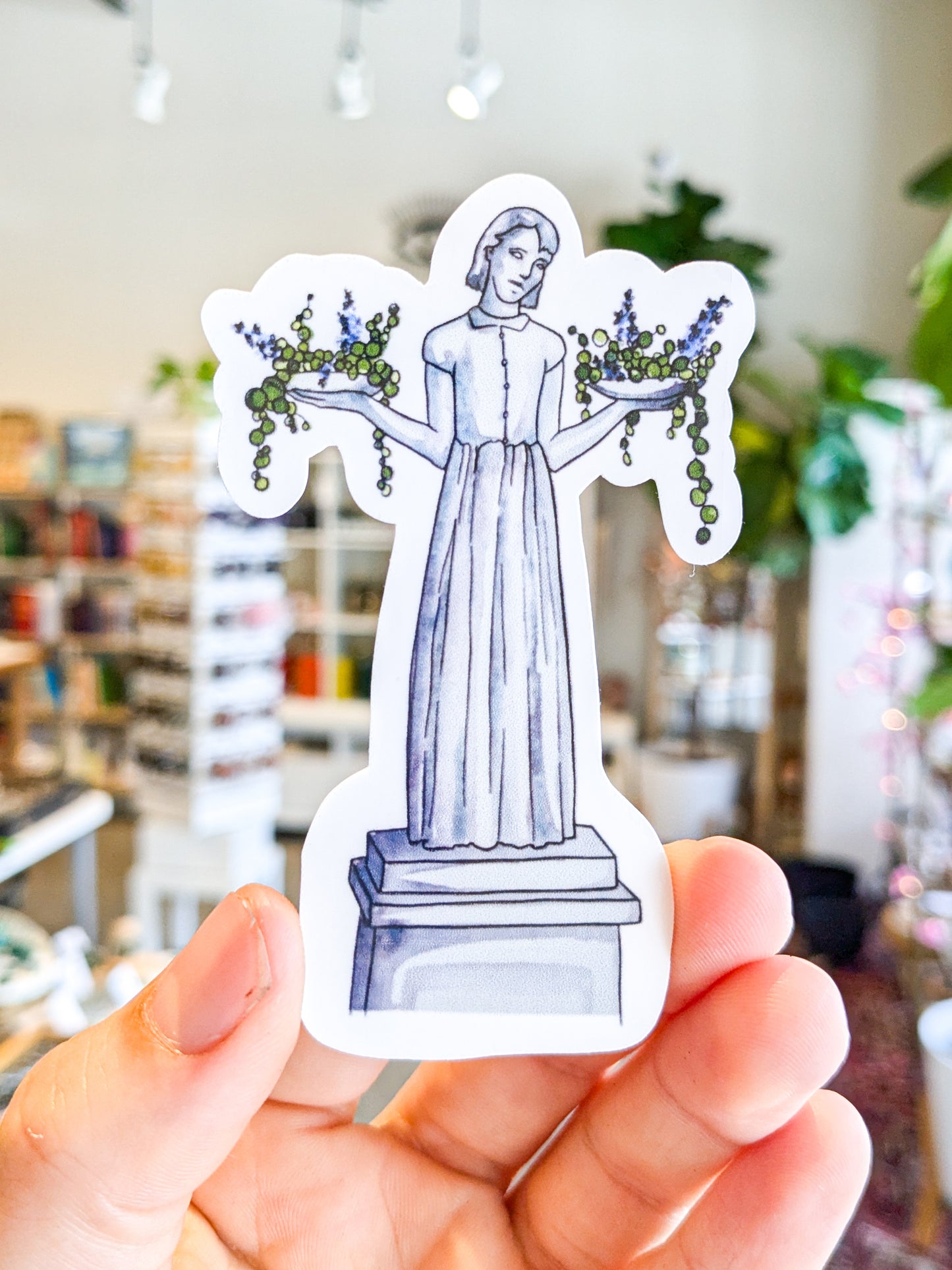 Waving girl Savannah sticker at Ordinary Magic in Savannah, GA
